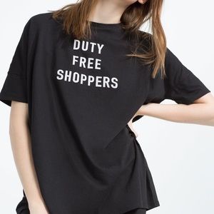 ZARA Trafaluc black “duty free shopper” shirt